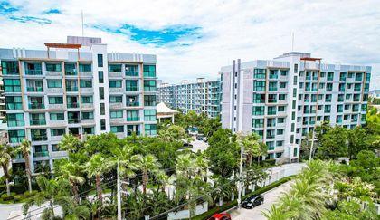 Dusit Grand Park Phase I — building exterior and parking court